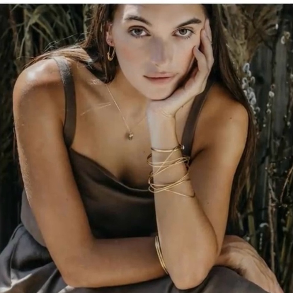 Handcrafted 14K gold bangles, 4 in the set.
